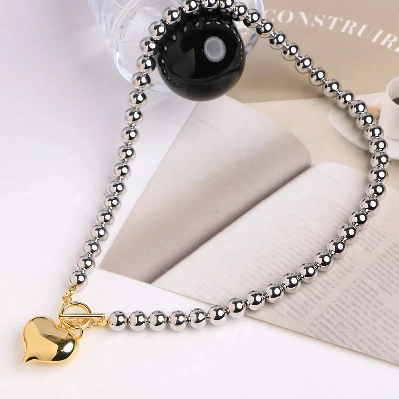 Collar de bolas con colgante corazón de acero inoxidable