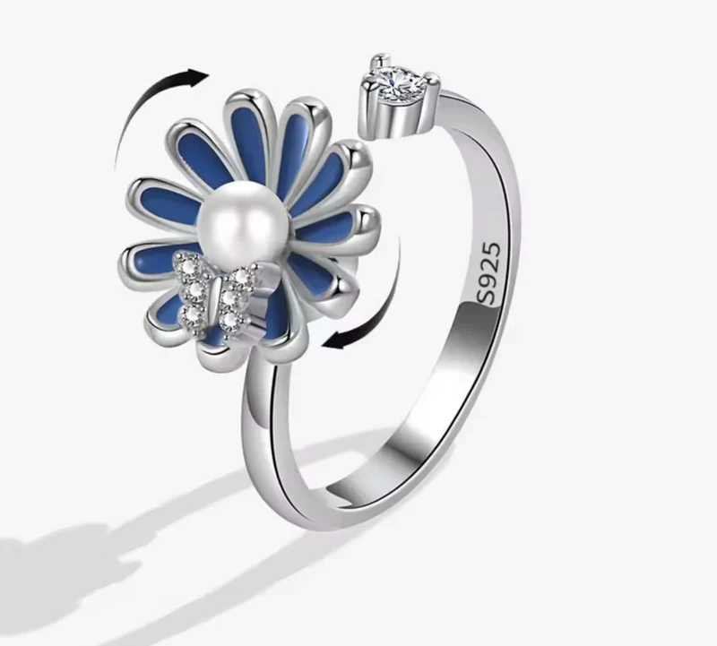 Anillo Antiestrés Flor Azul Giratoria en baño de Plata S925 | Ajustable