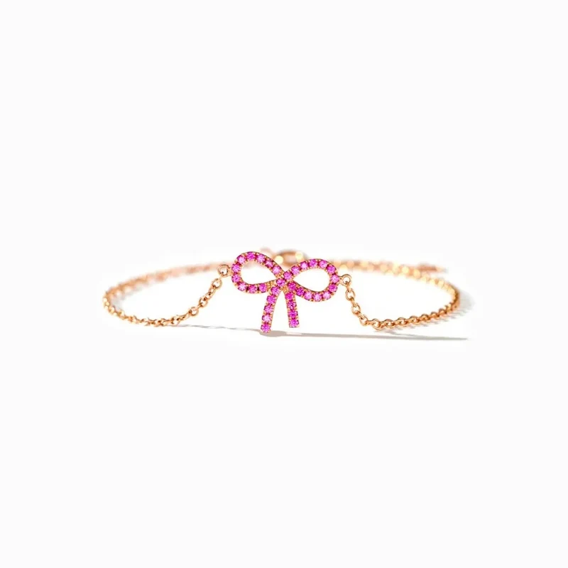 Pulsera lazo rosa de plata bañada en oro rosa con circonitas