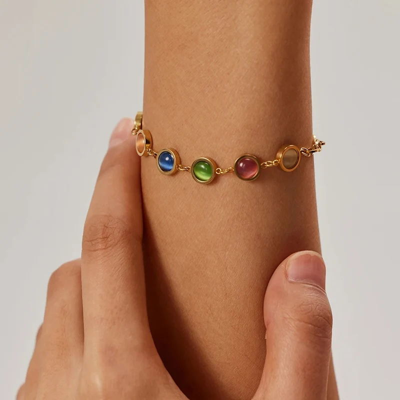 Pulsera de acero inoxidable dorado con piedras de colores ojo de gato
