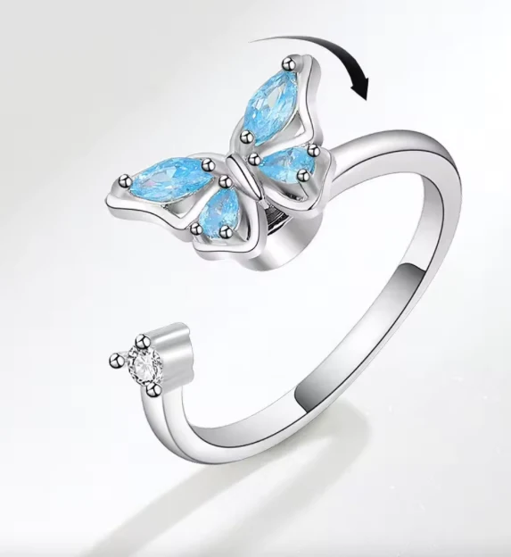 Anillo mariposa azul antiestrés giratorio –