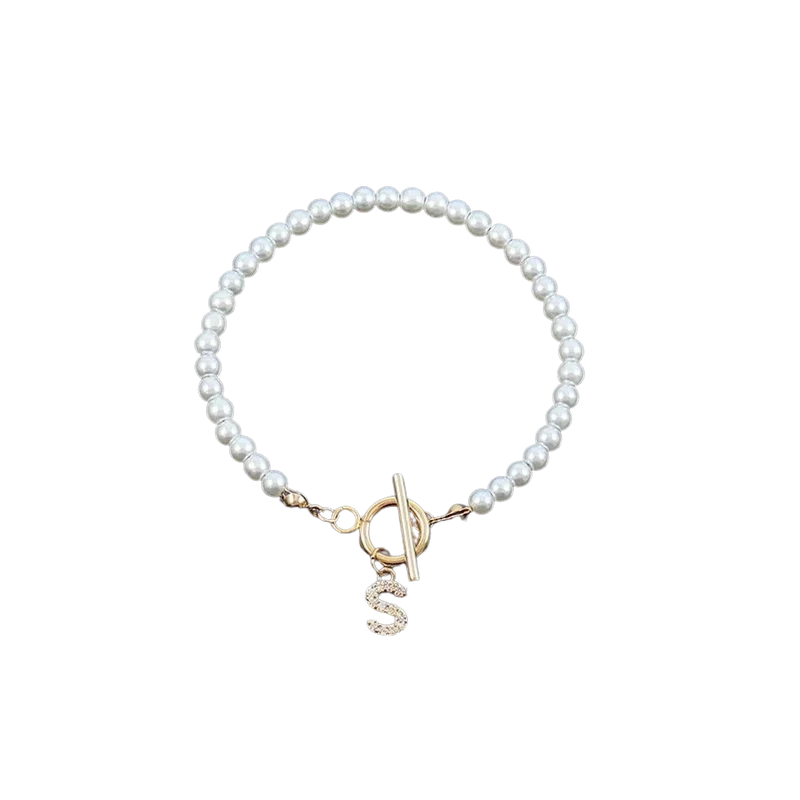 Pulsera de Perlas con Inicial Personalizada – Elegancia Atemporal